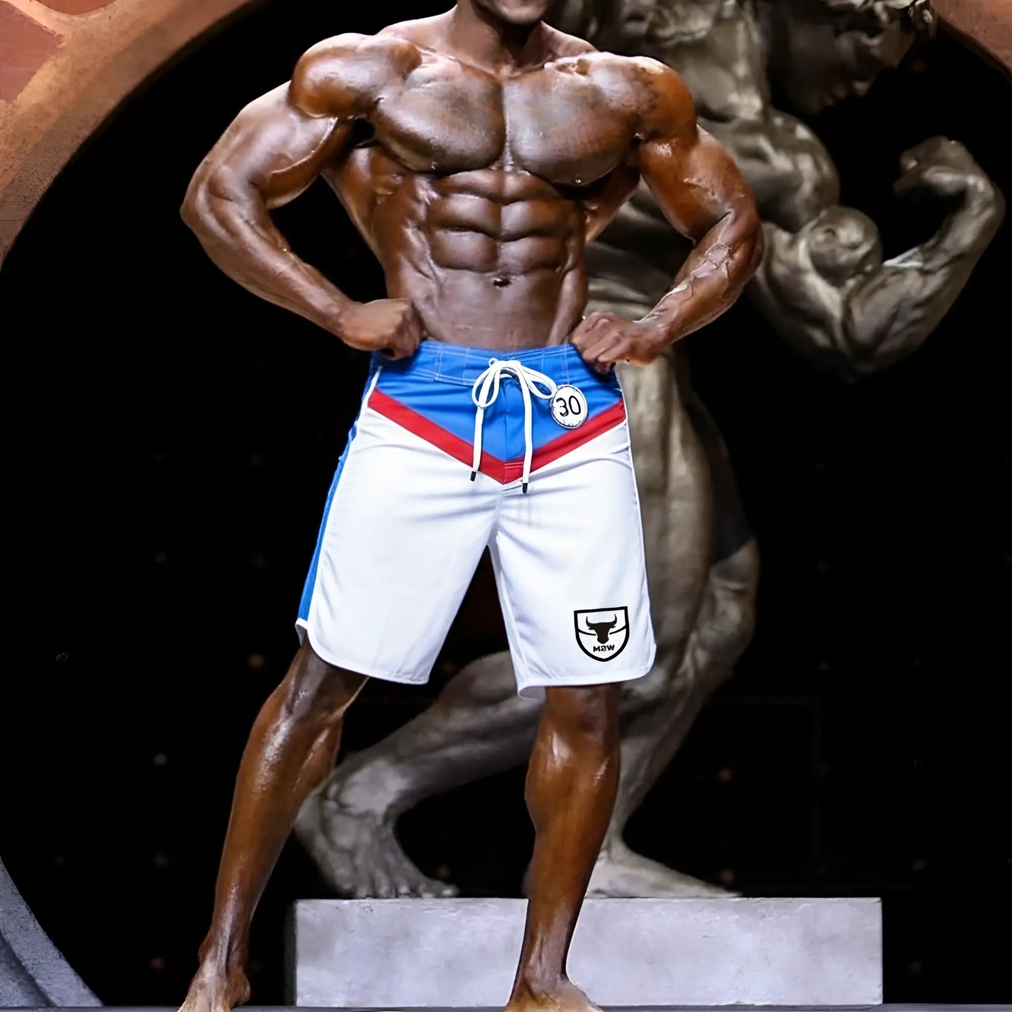 White athletic shorts with blue and red accents drawstring waistband and black bull logo metro malewear ifbb pro board short