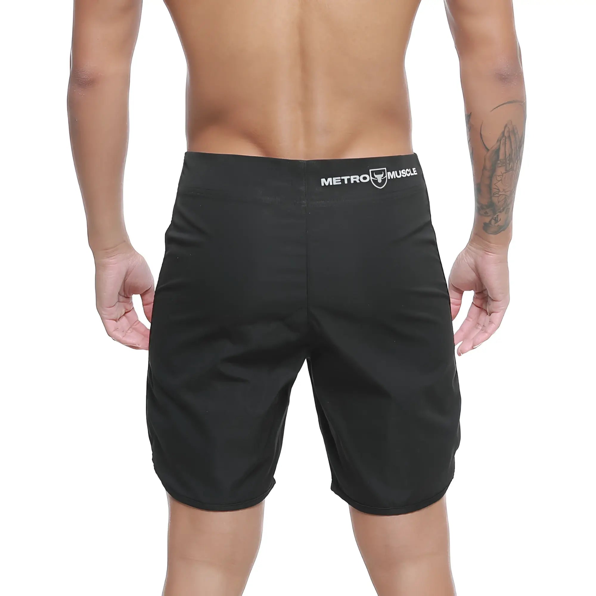 Black metro muscle men’s shorts with sleek athletic cut and subtle white branding on waistband by metro malewear