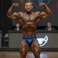 Shiny blue metallic briefs with subtle scale-like pattern from metromalewear metromusclewear jupiter competition suit