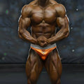 Orange athletic briefs with gray waistband and white logo metro malewear metromusclewear muscle trunk ochre 4700-14