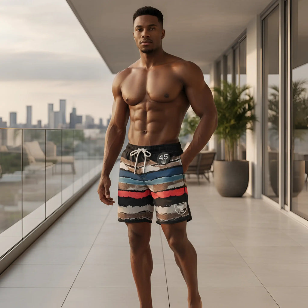 Striped swim trunks with black blue red and beige bands and white drawstring.