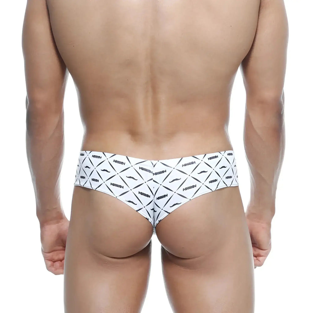 White briefs with bold black geometric mustache pattern and arrow brand print metro malewear micro cheek caballero 2027-03