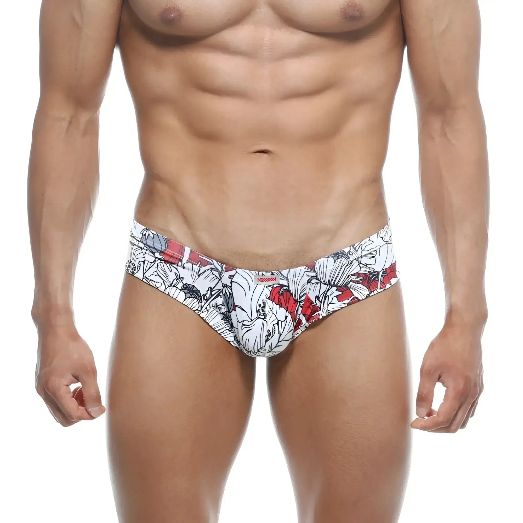 White and red floral-patterned men’s briefs with bold graphic design micro cheek style by metromalewear