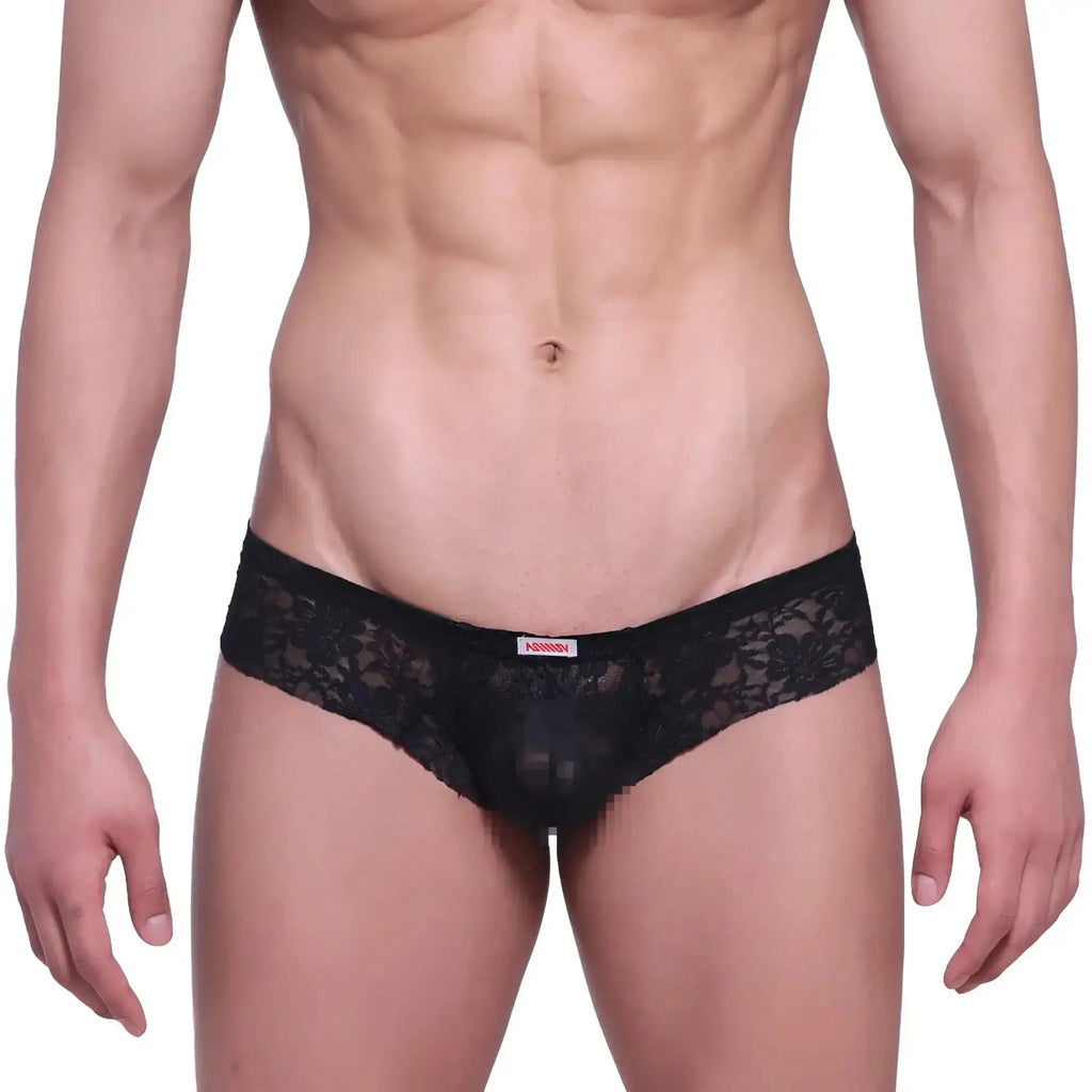 Black lace thong with delicate floral pattern and small red brand tag on waistband from MetroMaleWear