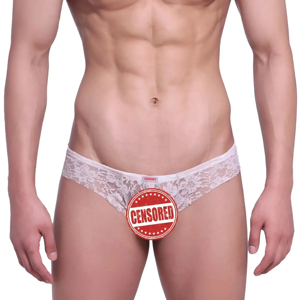 White lace thong with floral pattern and small red brand tag at waistband from MetroMaleWear Micro Cheek Lace Nude 2027-50