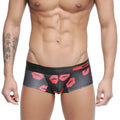 Black MetroMaleWear micro mini boxer briefs with bold red lipstick print and anony branded waistband