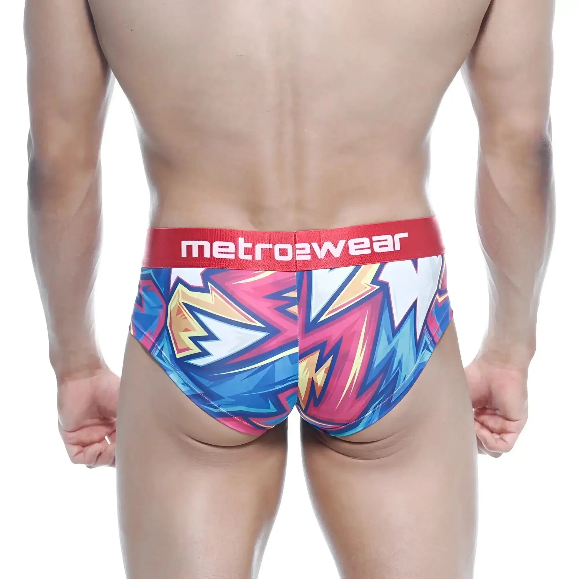 Vibrant graffiti-style men’s briefs in blue pink and yellow with red metro2wear waistband metro malewear mini cheek boxer