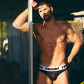 MetroMaleWear Nasca Brief black briefs with white elastic waistband featuring milan logo in bold black lettering