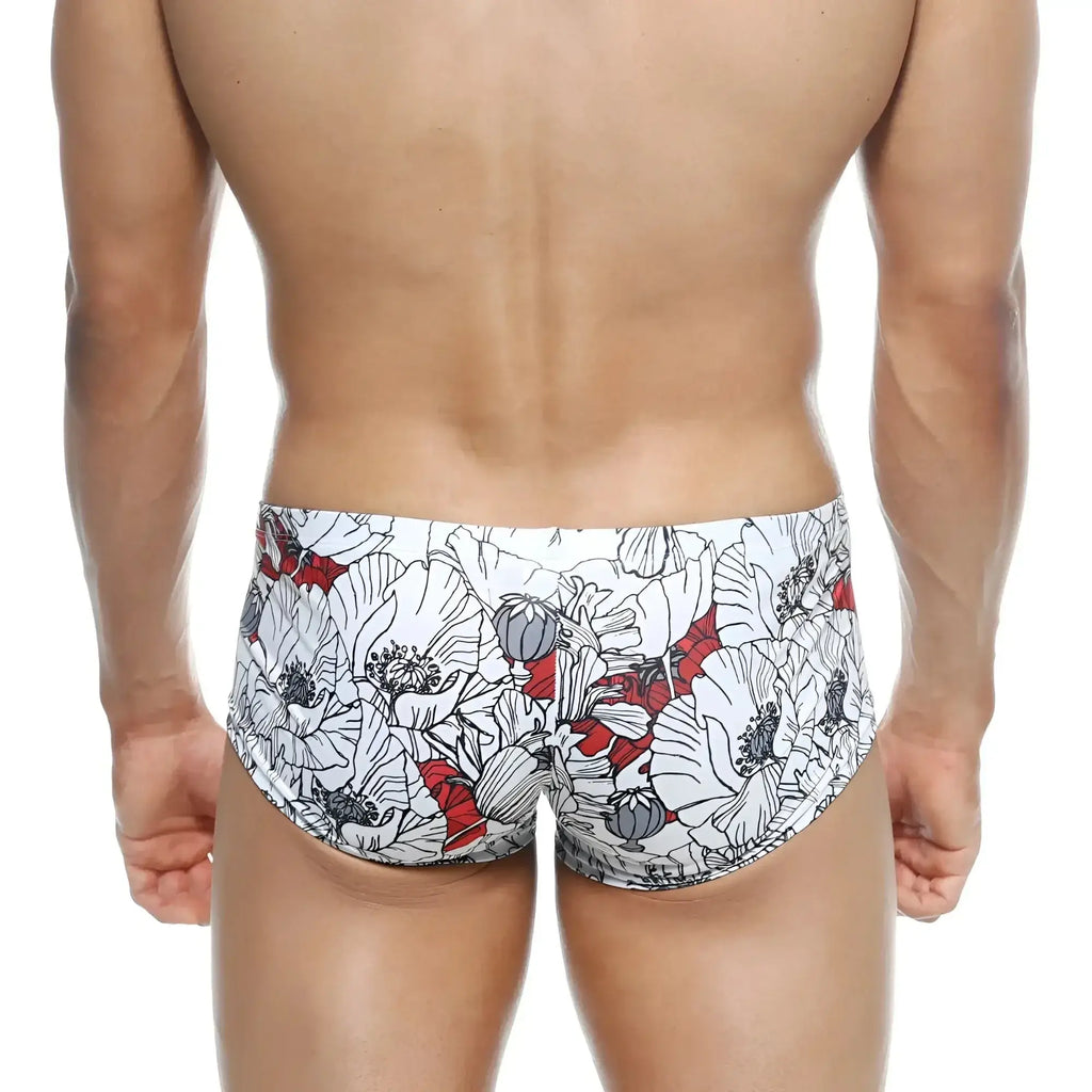 MetroMaleWear Oscar boxer swim trunks white with bold floral pattern black outlines and red accents