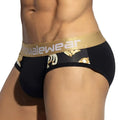 Black men’s briefs metroMaleWear panel bikini with gold waistband and ornate side patterns in black mesh fabric