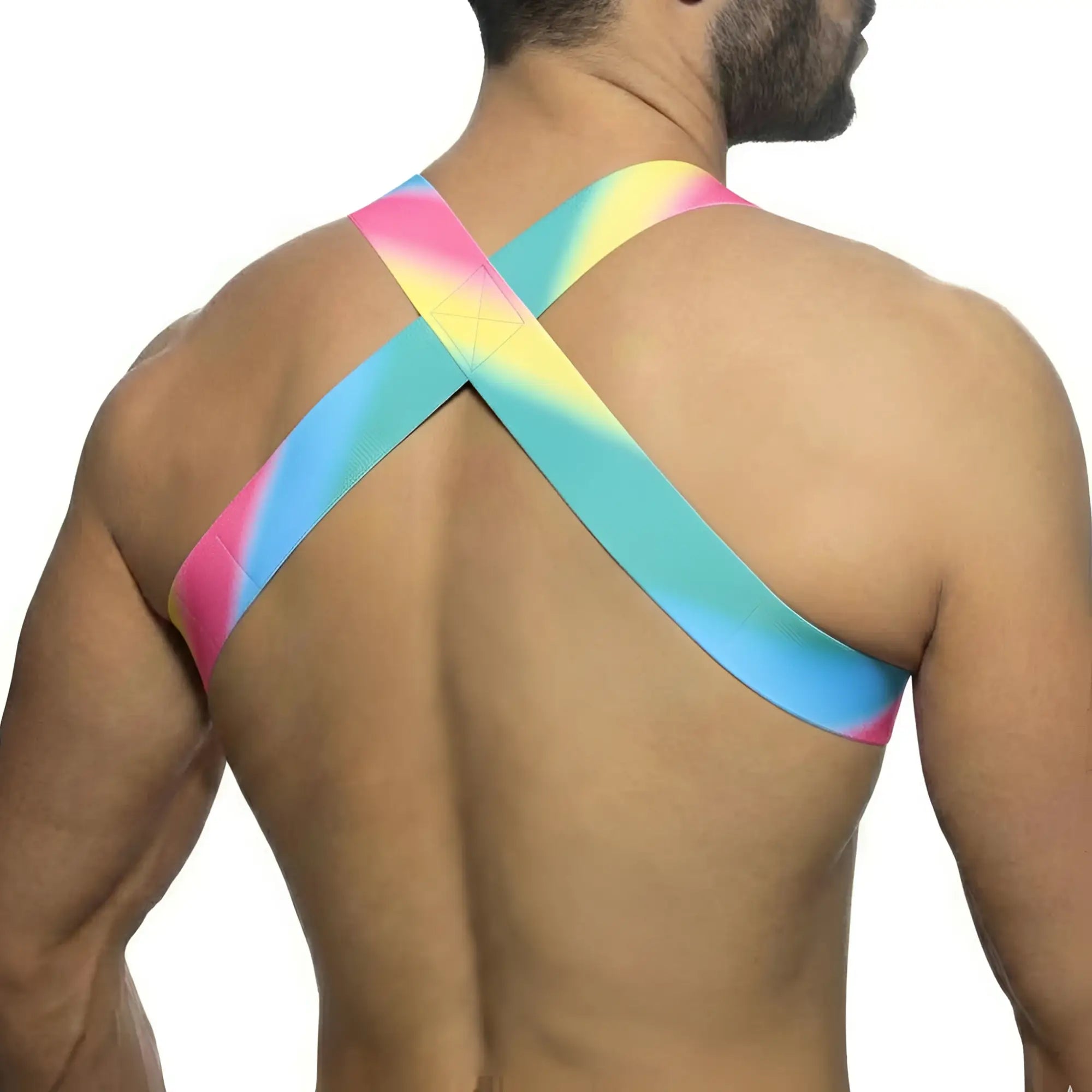 Vibrant rainbow-colored crossback sports bra by metromalewear with smooth stretchy fabric and pastel harness design