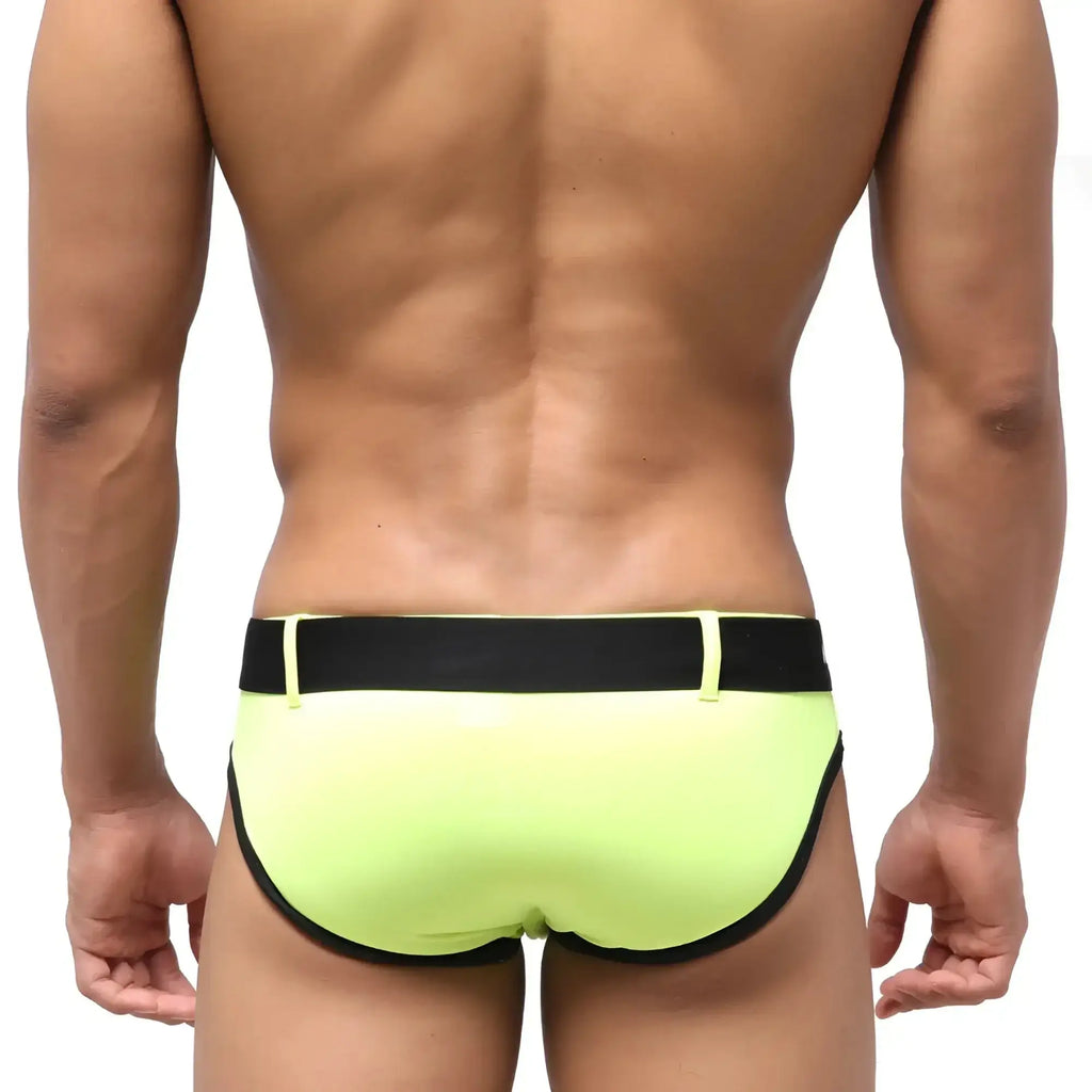 Neon green swim trunks with black elastic waistband and trim by MetroMaleWear Patagonia for swimming and beachwear