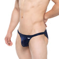 Navy blue lace thong with subtle pattern and small metro male wear brand tag on waistband peek-a-boo bikini style