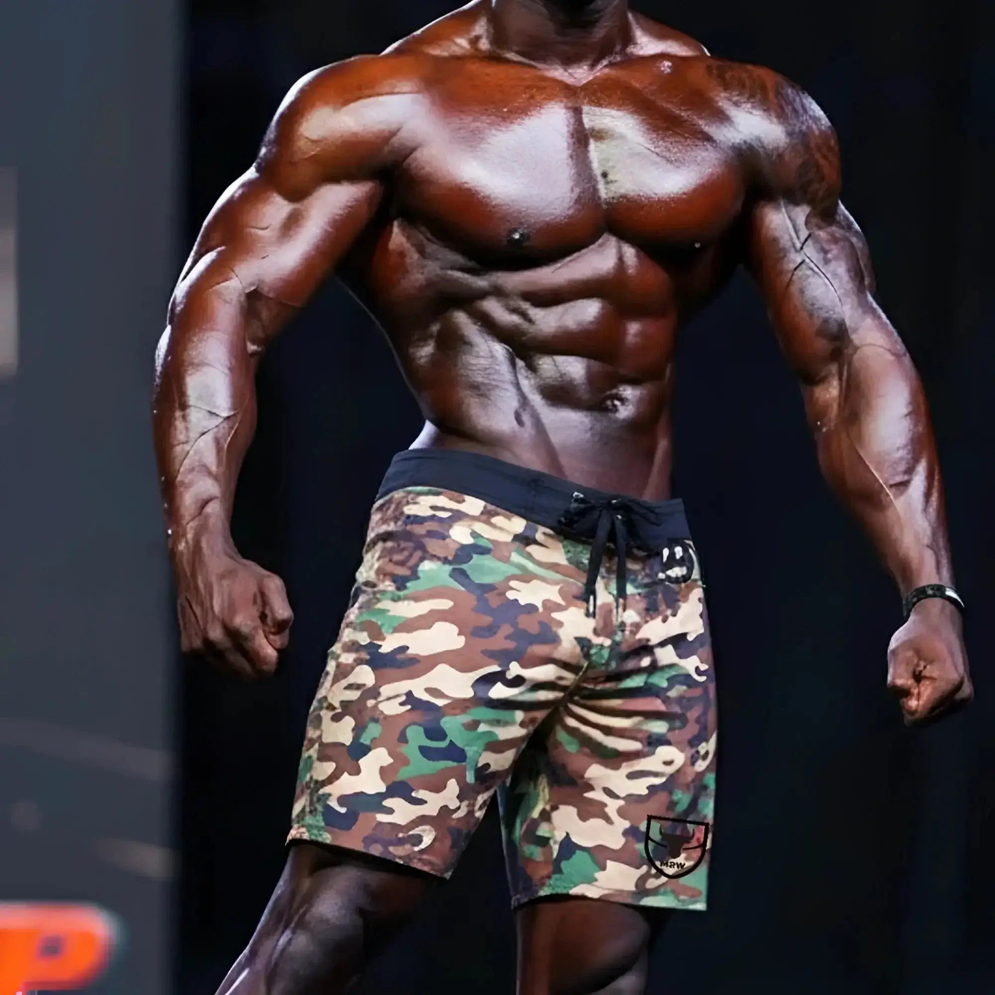 MetroMaleWear physique board short green camo with black drawstring waistband and logo patch on lower right leg