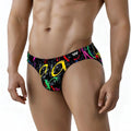 Black swim trunks MetroMaleWear Pinaculo Bikini 5103-M85 with vibrant neon pink yellow green and red graffiti graphic