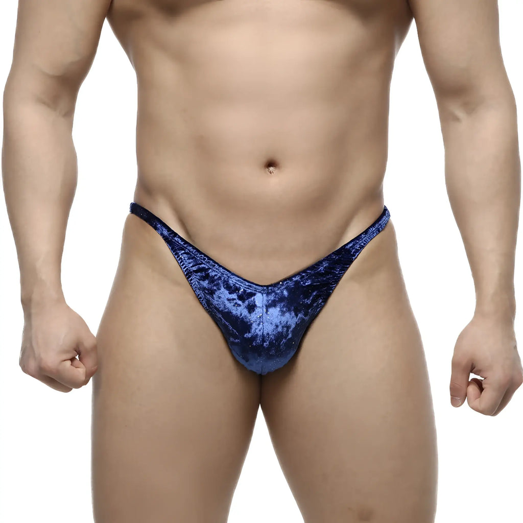 Blue velvet thong with a shimmering textured finish from metromalewear posingwear ifbb pro posing suit in blue