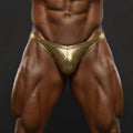 Shiny gold mesh briefs with a diamond-patterned design from metromalewear posingwear metallic gold check posing suit