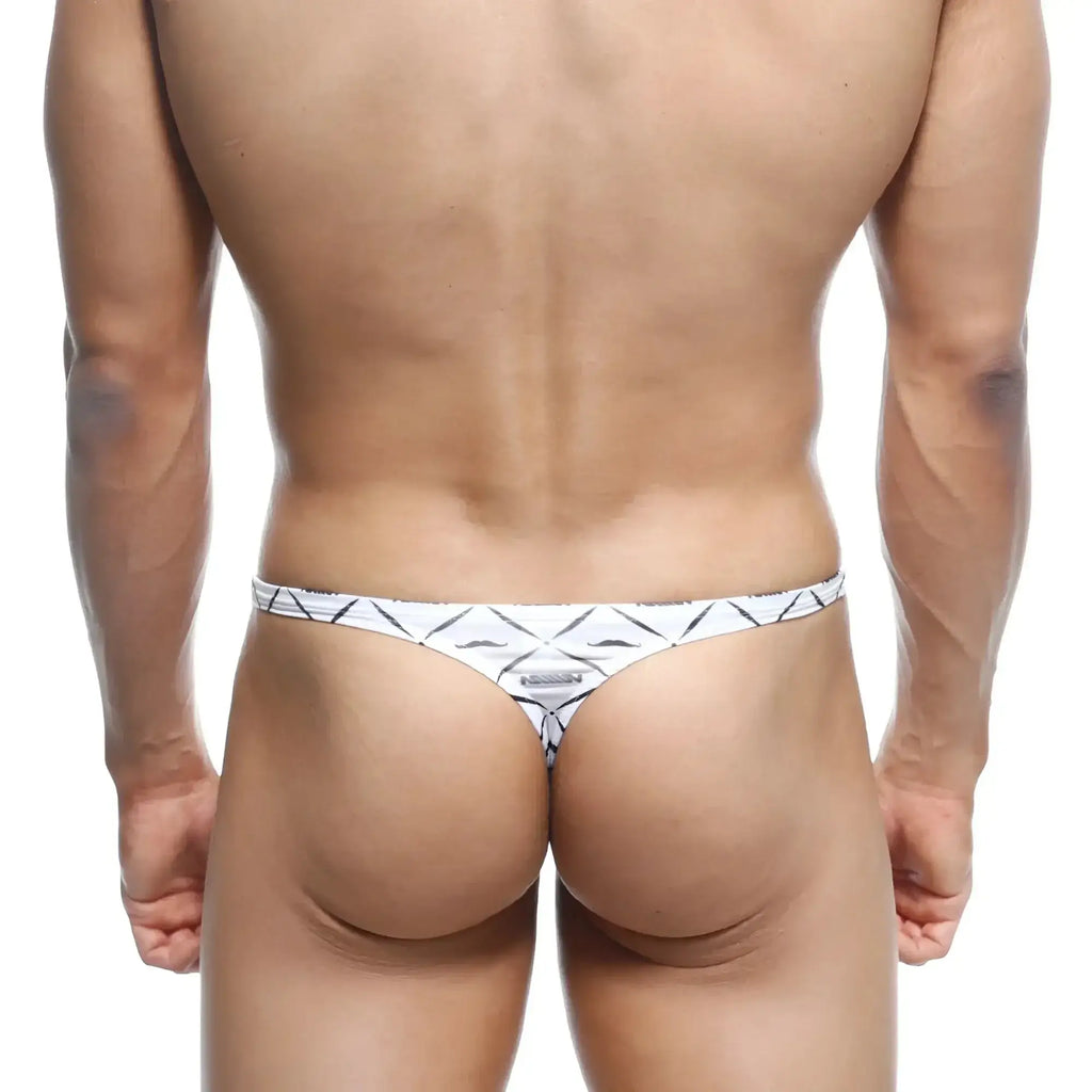 White thong with black geometric pattern and small metallic logo at center by metroMalewear pouch thong caballero 2302-03