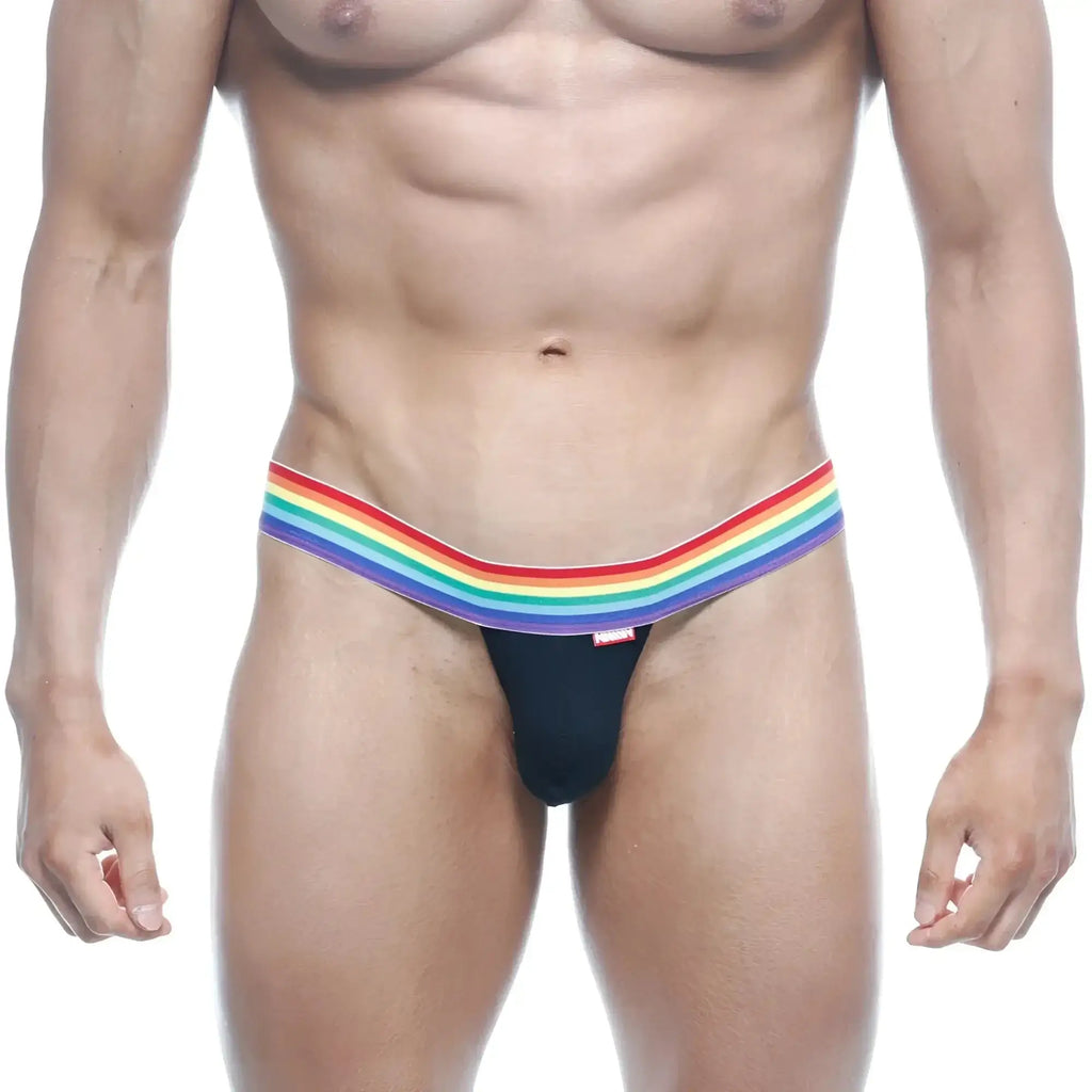 Black MetroMaleWear Pride thong with rainbow-striped waistband showing front in soft stretch fabric