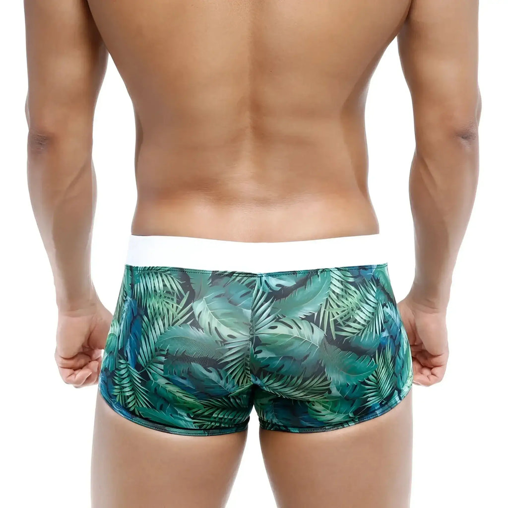 MetroMaleWear Profundo swim boxer briefs with green tropical leaf pattern and white waistband for swim use