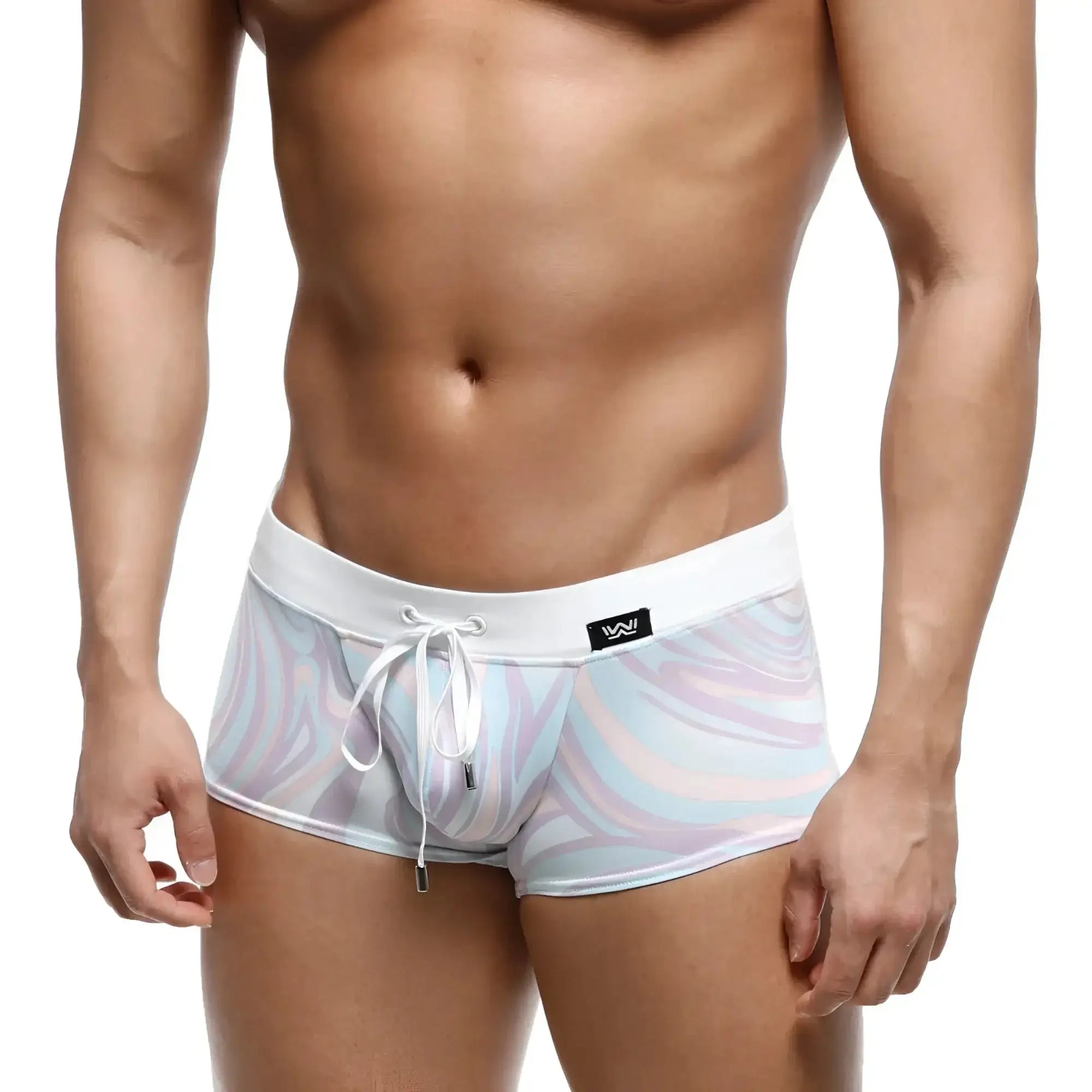 White swim trunks with pastel lavender light blue and pink swirl pattern metroMalewear profundo swim boxer briefs