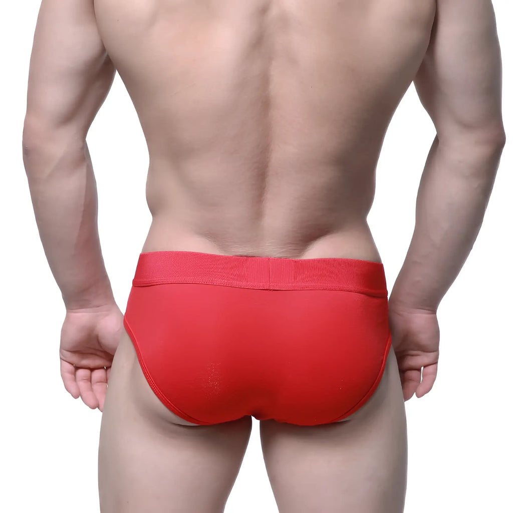 Red athletic briefs by metromalewear with a snug elastic waistband designed for comfortable active wear