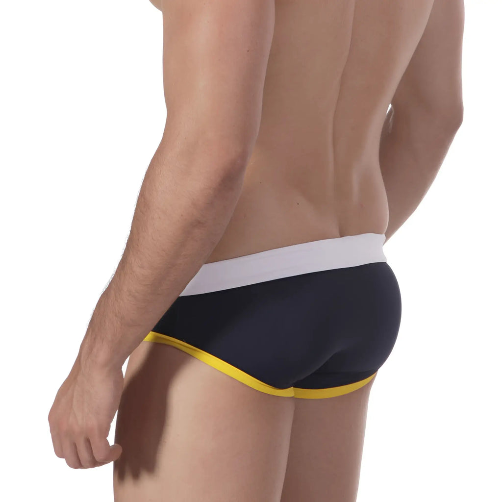 Navy blue metro malewear quantum swim brief 4916-82 with white waistband and yellow trim for swimming use