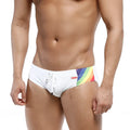 White swim trunks with vibrant rainbow stripe and red metro malewear brand tag for beachwear use