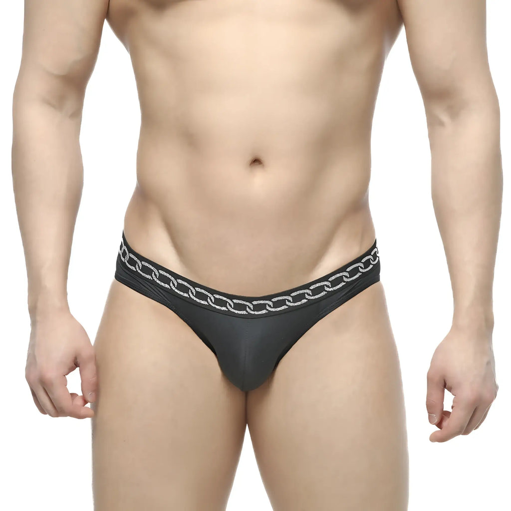 Black thong bikini by MetroMaleWear with silver chain pattern waistband in black fabric shown from the front