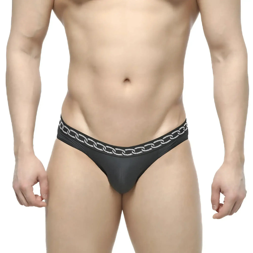 Black thong bikini by MetroMaleWear with silver chain pattern waistband in black fabric shown from the front