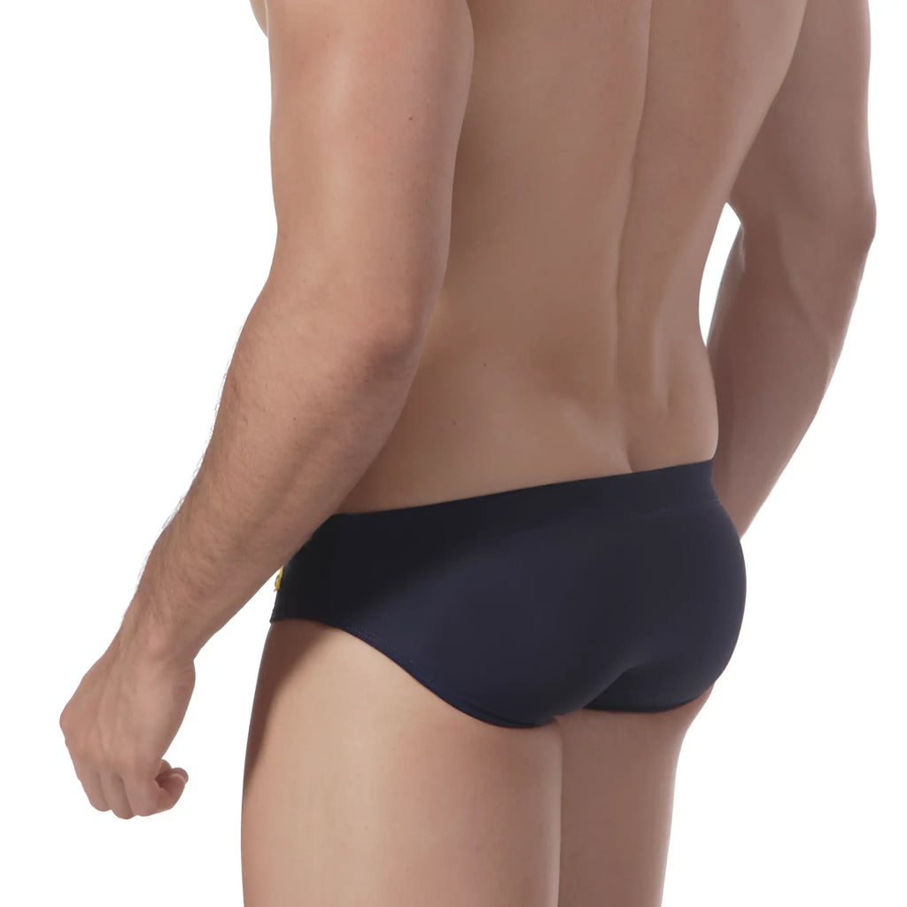 Navy blue MetroMaleWear Scottish swim brief with gold logo on left hipband made of quick-dry fabric