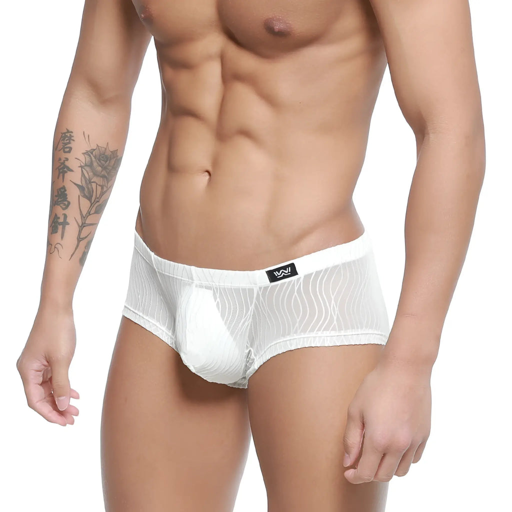 White mesh briefs with solid white pouch and subtle wavy texture featuring black logo tag on waistband metroMalewear Sedosa trunk