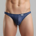 Blue denim-style men’s briefs with subtle textured weave and white brand tag on the waistband by MetroMaleWear.