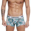 Teal and gray leaf-patterned mens boxer briefs with white elastic waistband and black MetroMaleWear branding