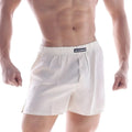 White cotton boxer shorts with button closure and elastic waistband featuring metromail label from MetroMaleWear