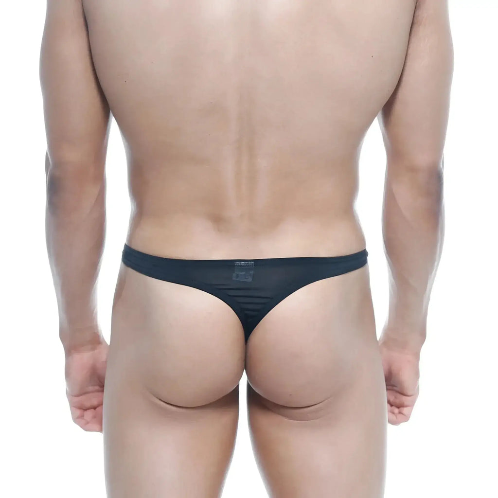Back view of metromalewear silk black thong featuring black mesh with subtle textured pattern and center brand tag
