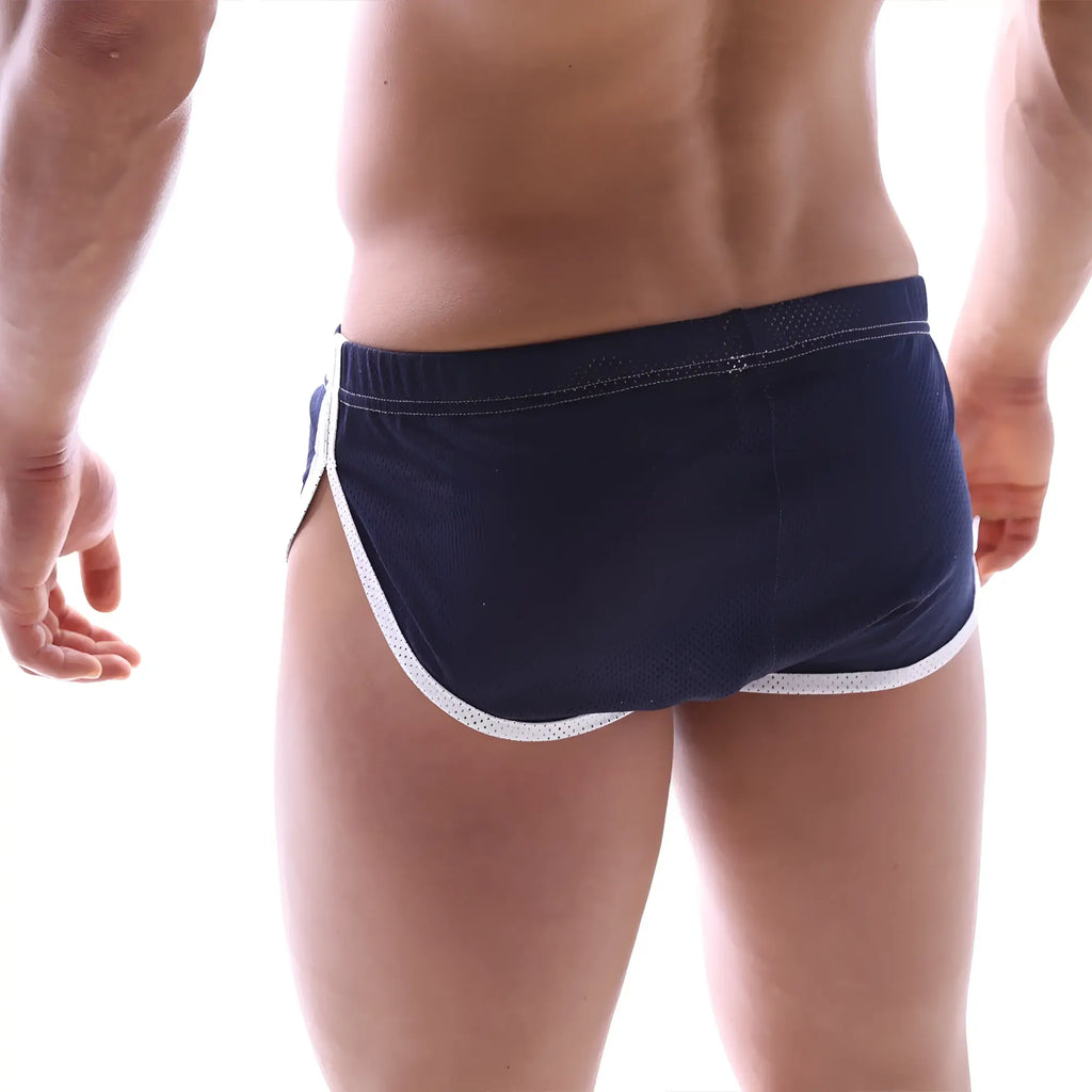Navy blue mesh athletic briefs with white perforated trim from metro male wear soccer split short 4705-28