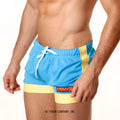MetroMaleWear soccer swim short sky 4704-08 features bright blue and yellow mesh athletic fabric with a white drawstring waist