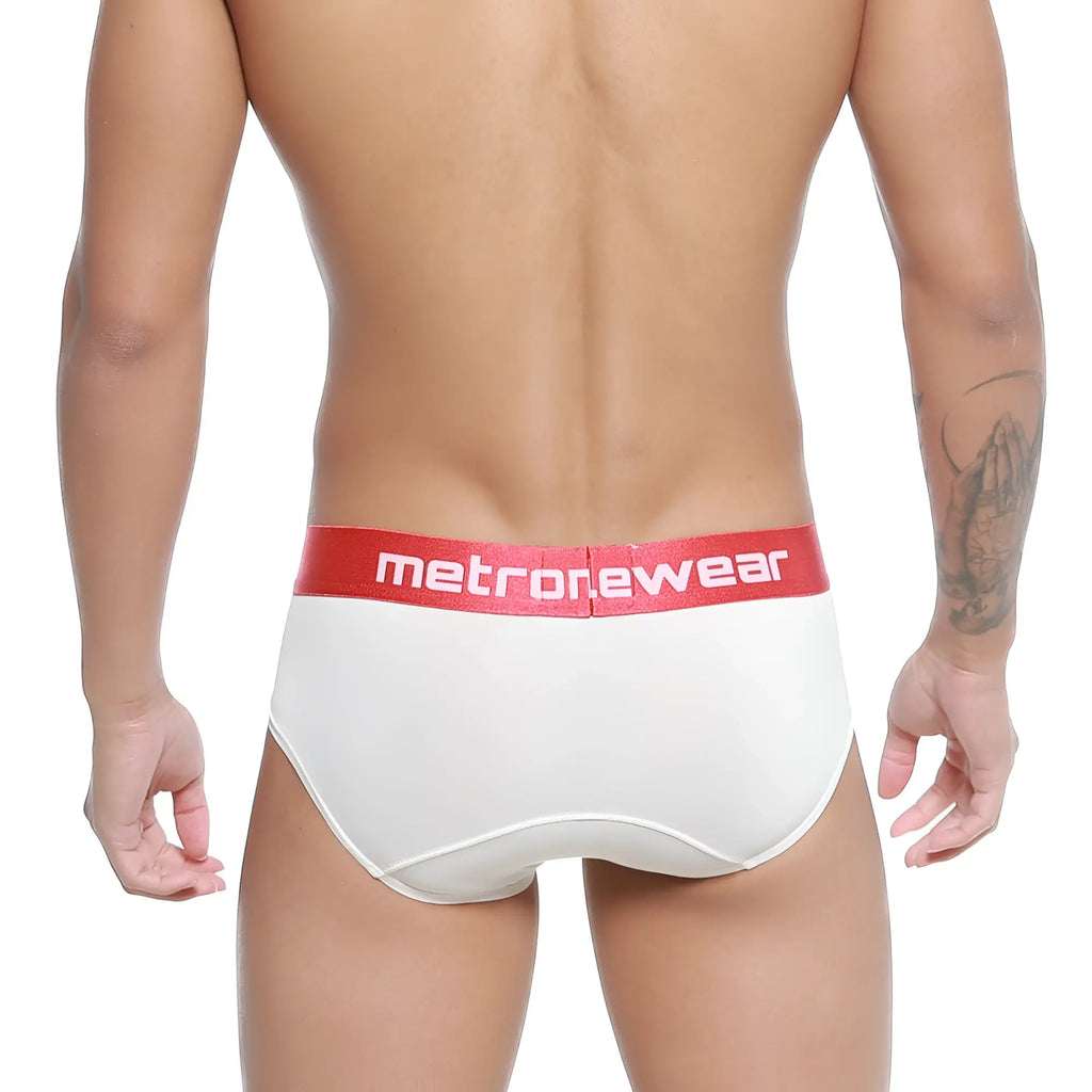 White briefs with a red waistband featuring the metroMaleWear logo in white soft fabric for comfortable wear