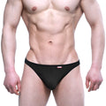 Black MetroMaleWear solitario thong 1162-20 with snug fit and small red logo on waistband front side