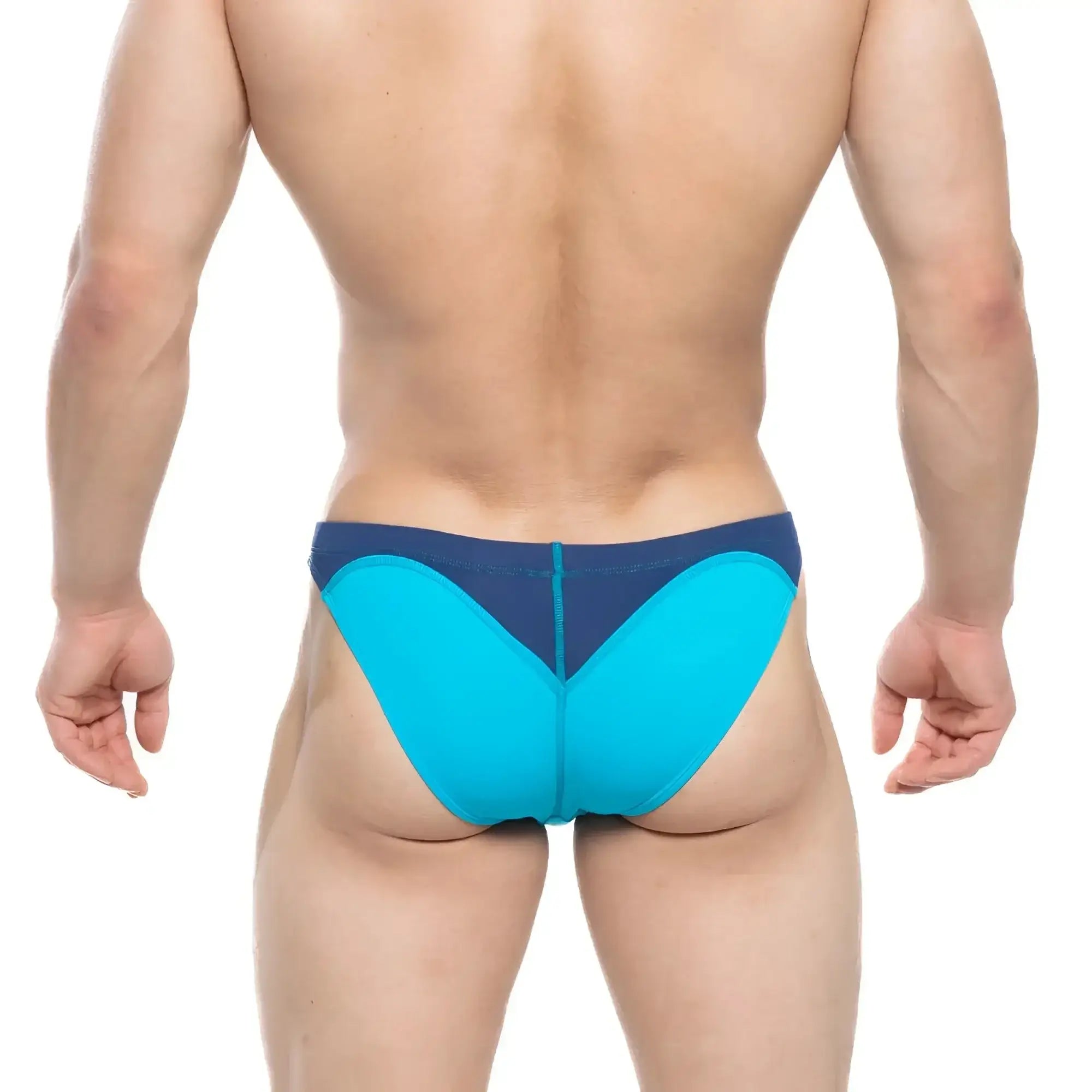 Bright turquoise and navy blue athletic briefs with a sleek form-fitting design by MetroMaleWear Splash Swim Bikini