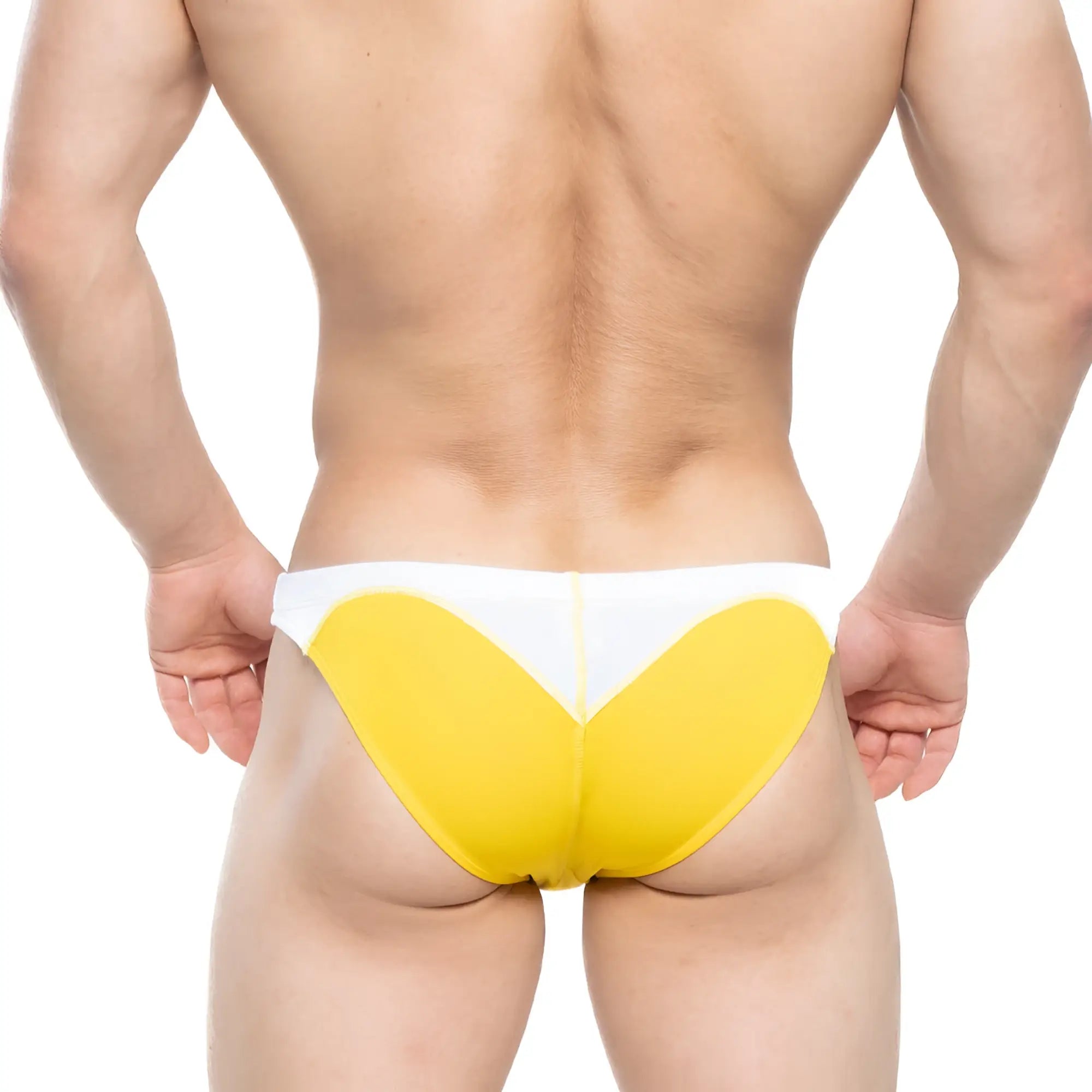 Yellow and white MetroMaleWear splash swim bikini briefs with bold heart-shaped design for athletic use