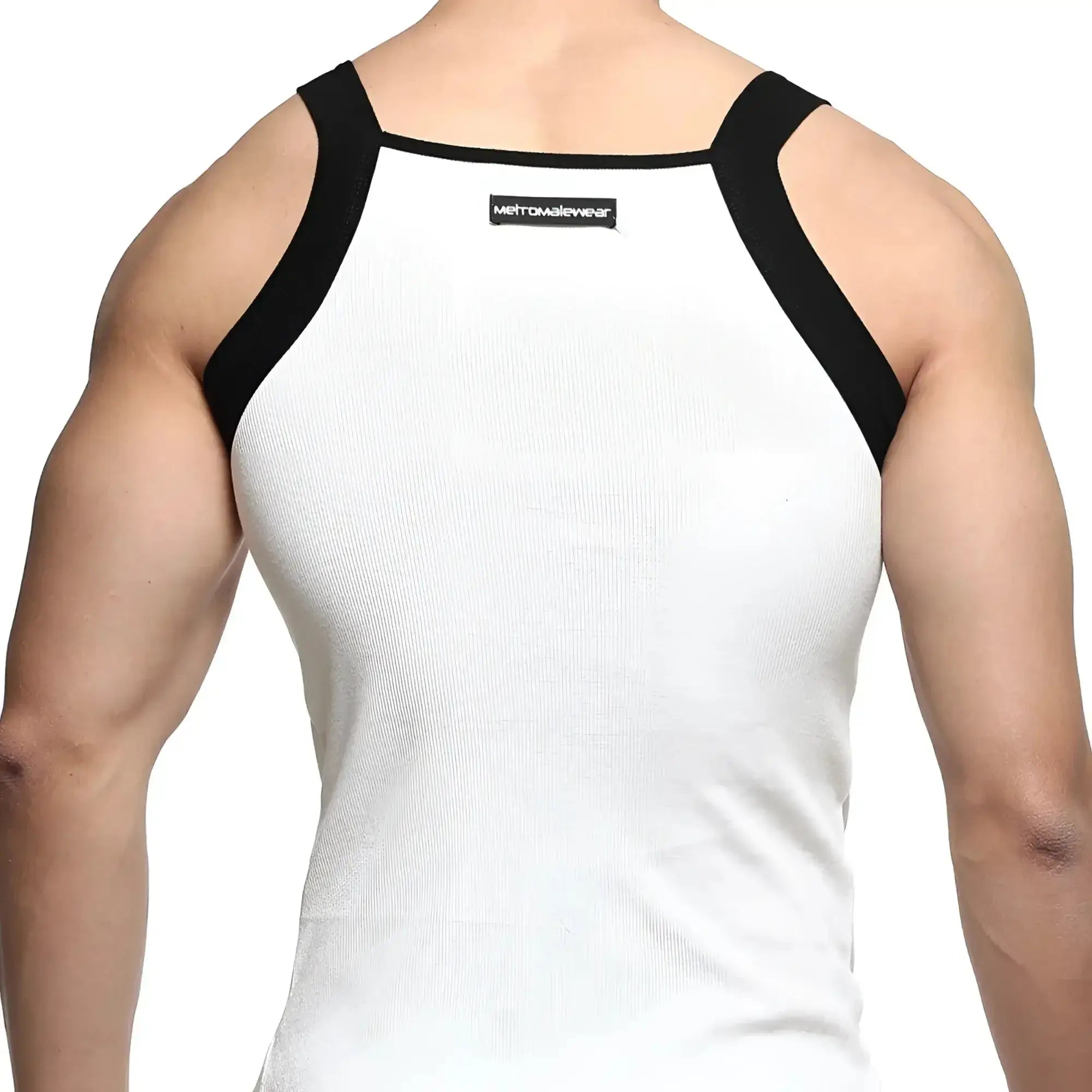 White ribbed square cut tank top with black shoulder straps and metromalewear label visible on the back