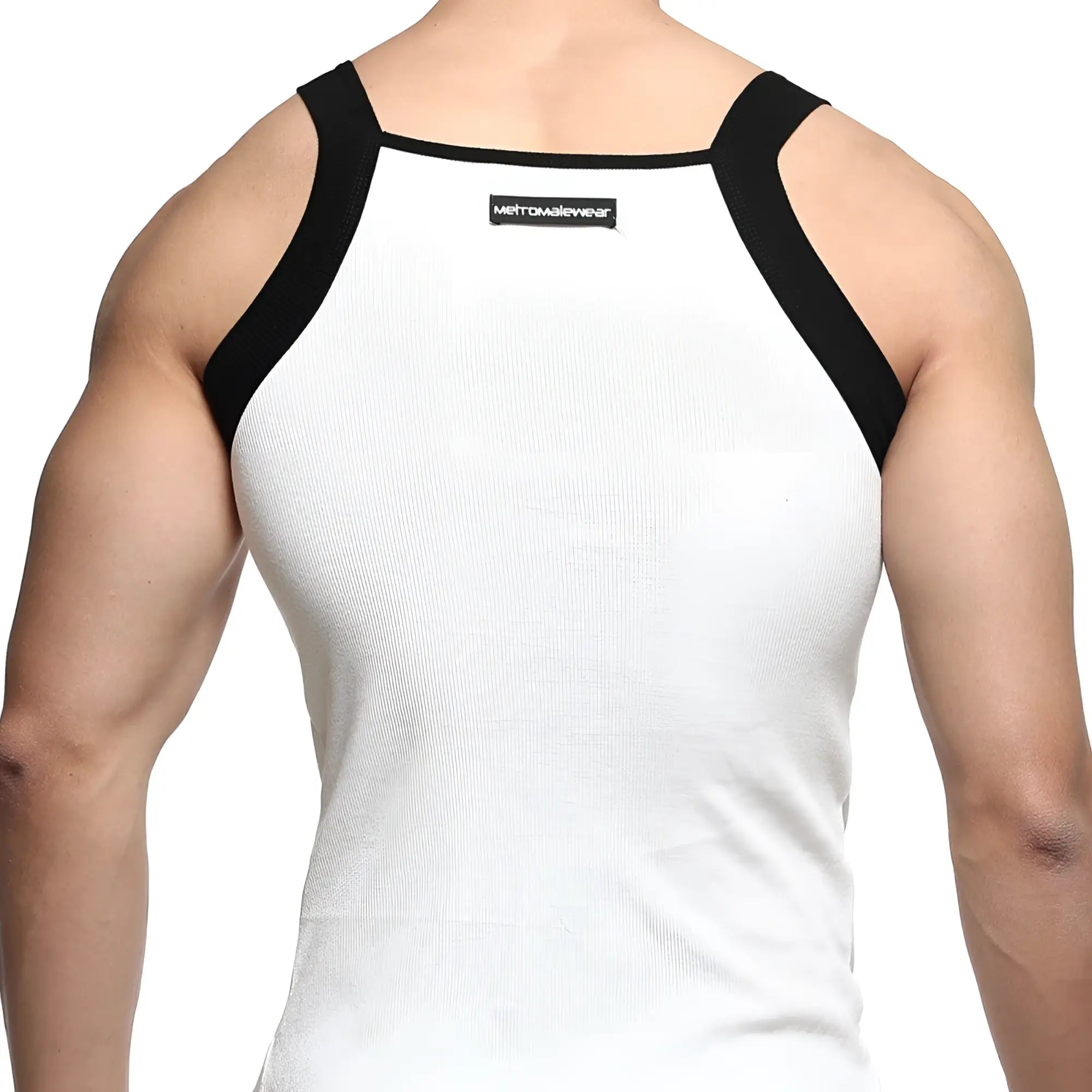 White ribbed square cut tank top with black shoulder straps and metromalewear label visible on the back