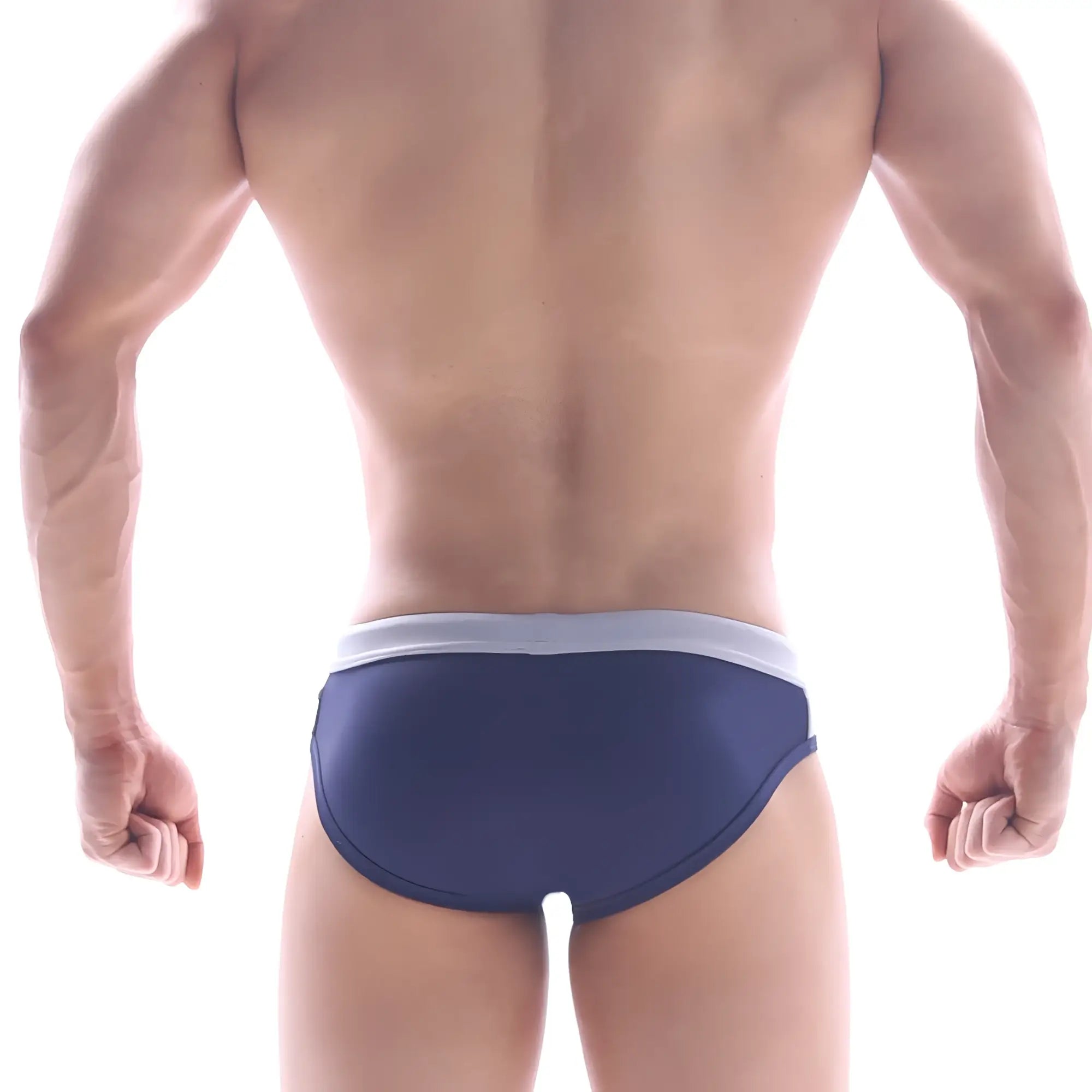 Navy blue MetroMaleWear STEEL swim brief with a white waistband designed for comfortable swimwear use
