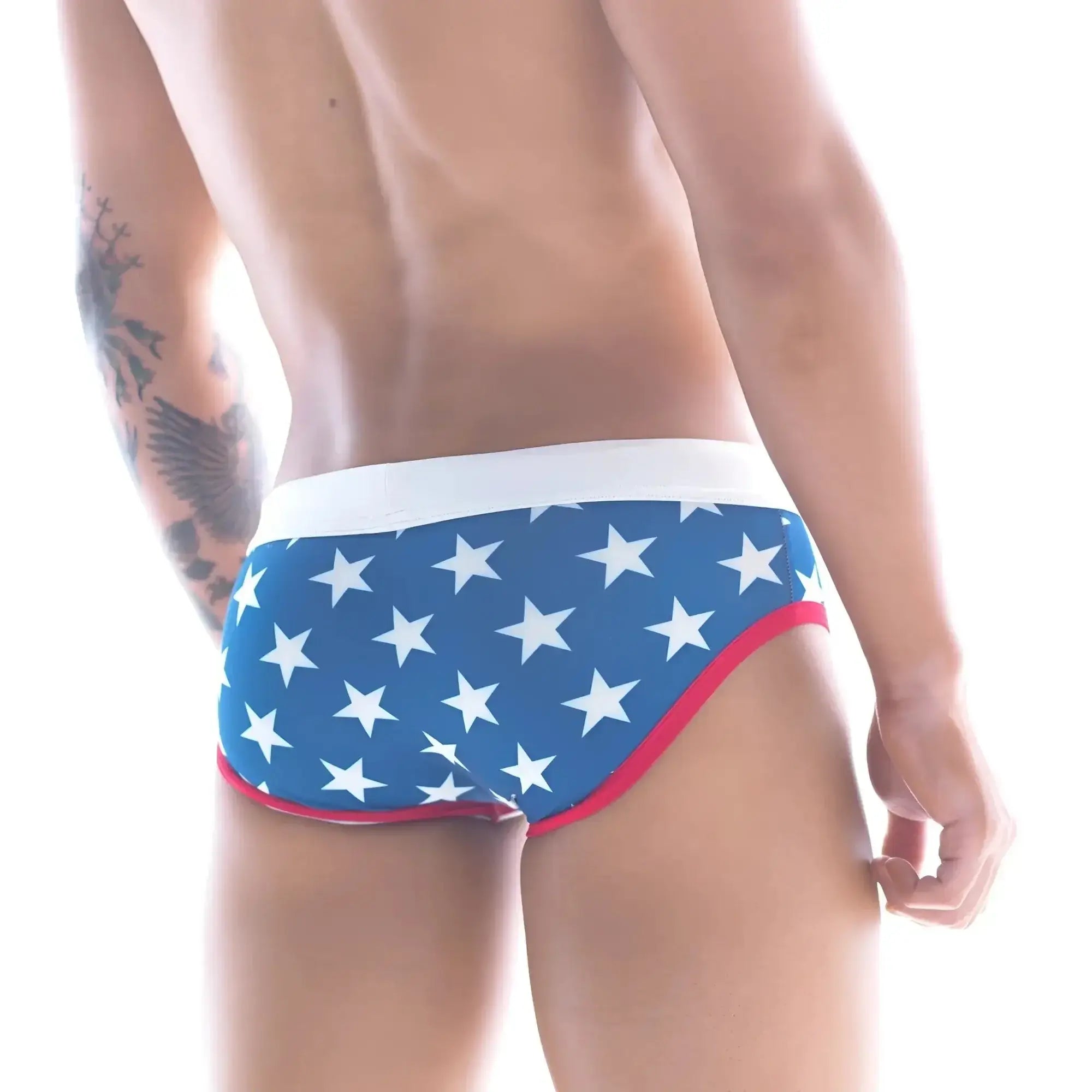Blue swim trunks with white stars and red trim metro male wear stella swim brief 4916-92 front view