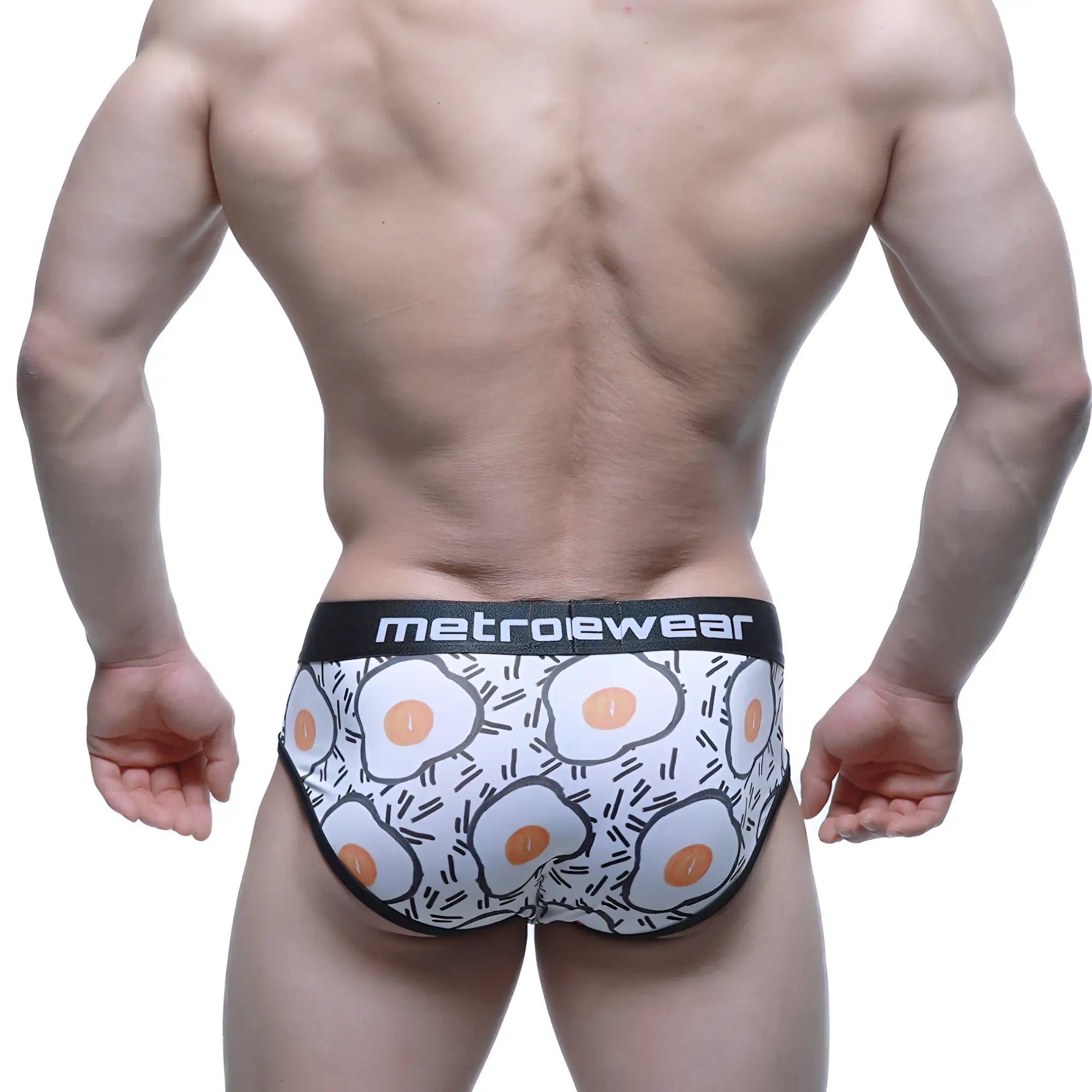 White briefs with a playful fried egg pattern in orange and black and metroewear branded waistband MetroMaleWear Sunny Side Brief 5203-64