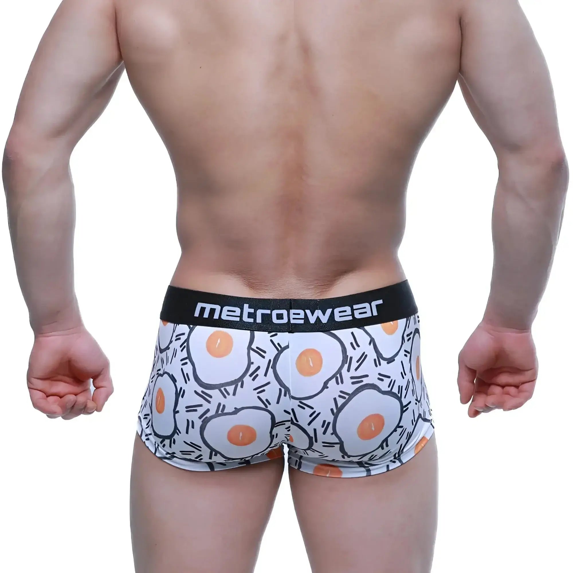 White boxer briefs with playful fried egg pattern and black waistband branded metroewear.