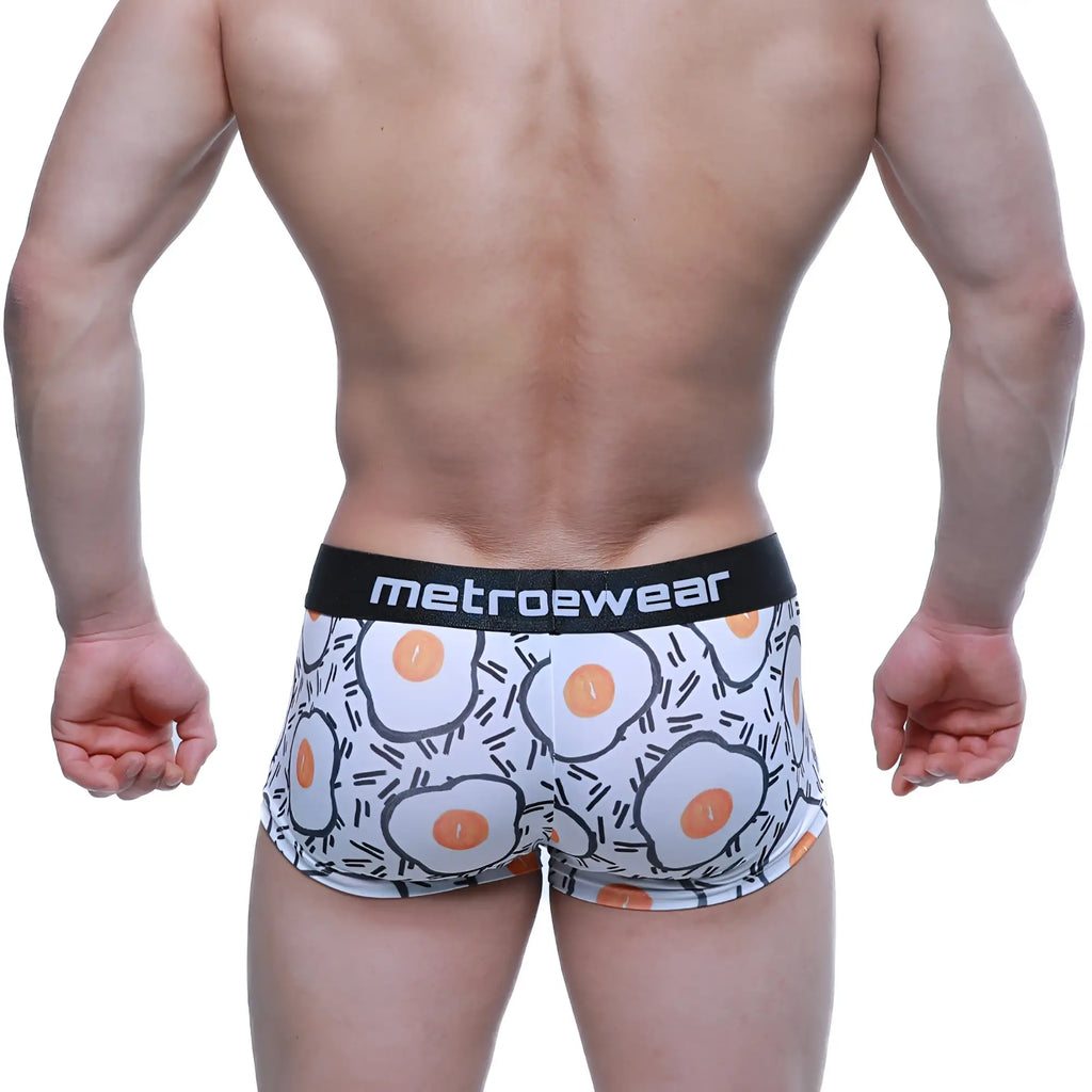 White boxer briefs with playful fried egg pattern and black waistband branded metroewear metro malewear sunny side short boxer