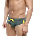 Dark green MetroMaleWear swim trunks with bright yellow drawstring and side stripes for comfortable beachwear